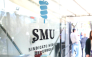 SMU fachada puerta logo